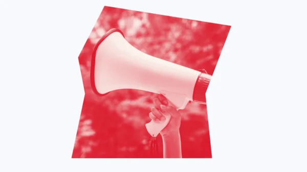 Red and white graphic of a megaphone