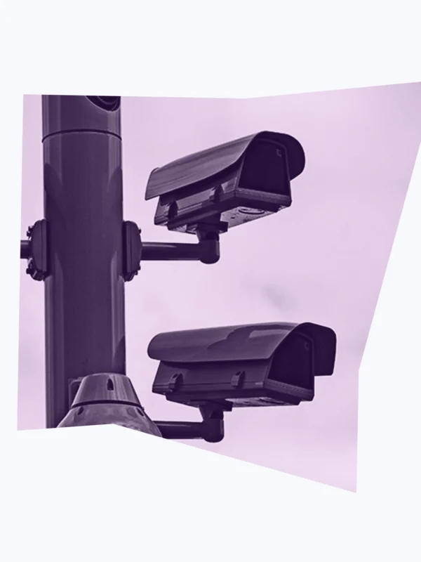 Light and dark purple graphic of surveillance cameras.