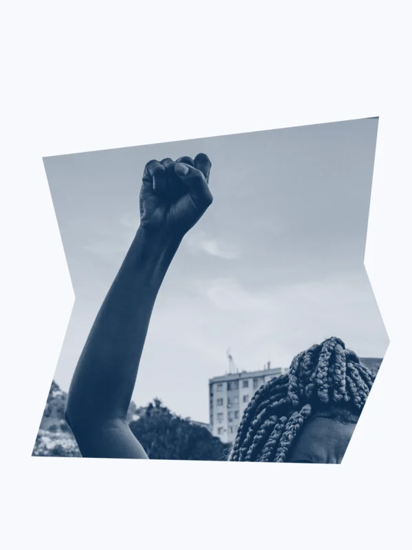 Dark blue and white graphic of a person with their fist raised.