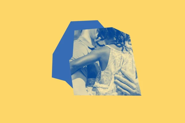 Yellow and blue graphic with an adult holding a young child.