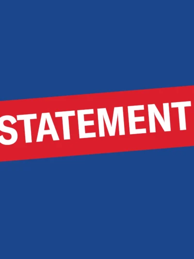 Dark blue graphic with red and white "statement" text.