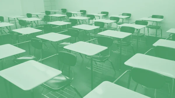 Green image of school desks.