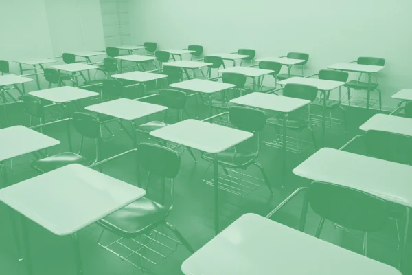 Green image of school desks.