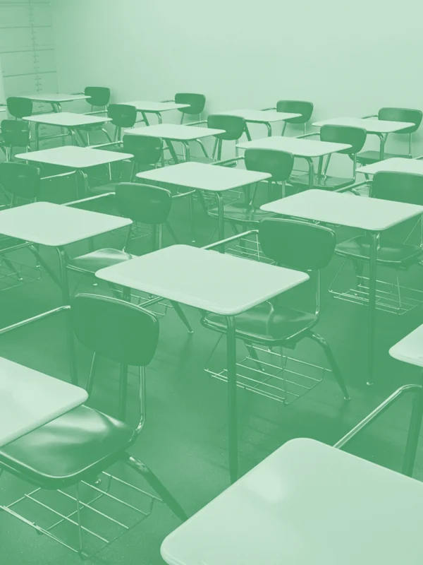 Green image of school desks.