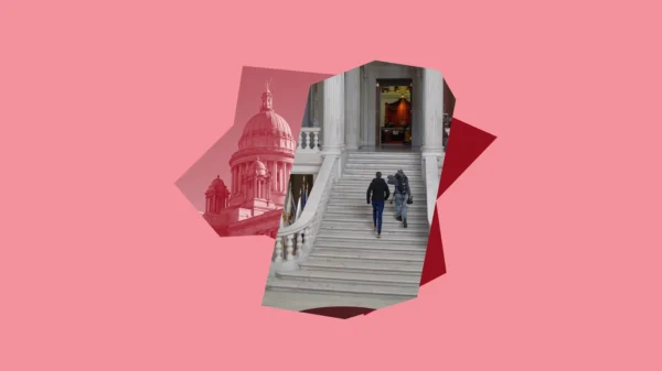 Pink and red graphic with image of State House rotunda stairs.