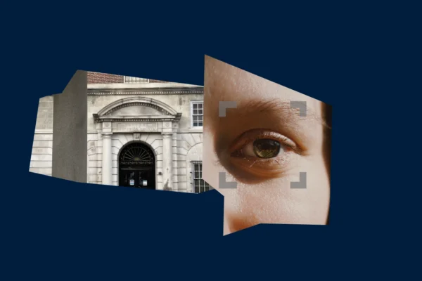 Dark blue background with an image of a Providence courthouse and a photo of a person's eye.