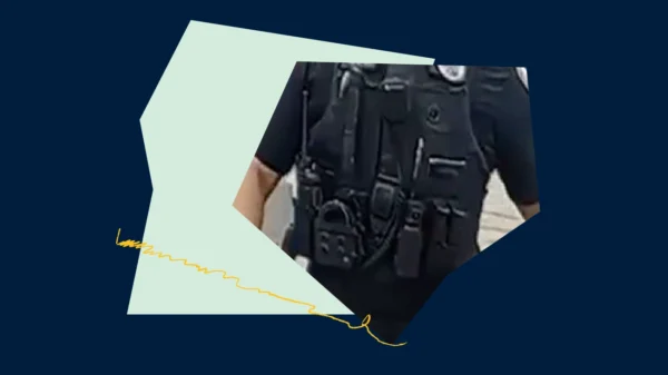 Dark blue graphic with a light green shape, yellow scribble, and low resolution photo of a police officer's vest with a body worn camera